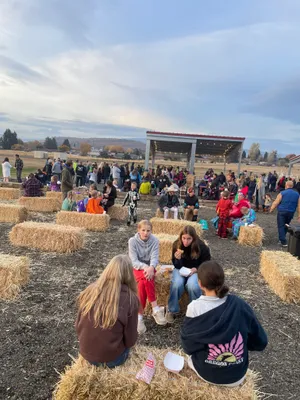 Crowd enjoying hot dogs at Harvest Festival