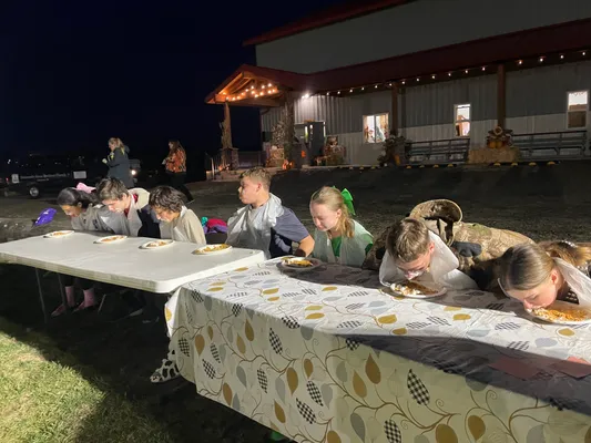 Pie eating contest at Harvest Festival
