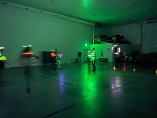 Youth playing with light sticks